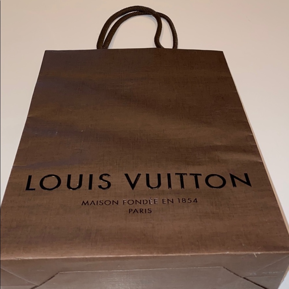 Authentic Louis Vuitton paper bag string straps
